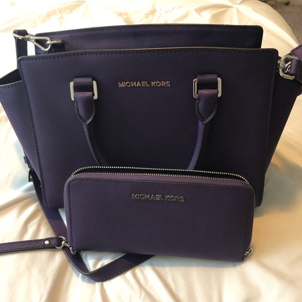 Purple Michael Kors purse and wallet